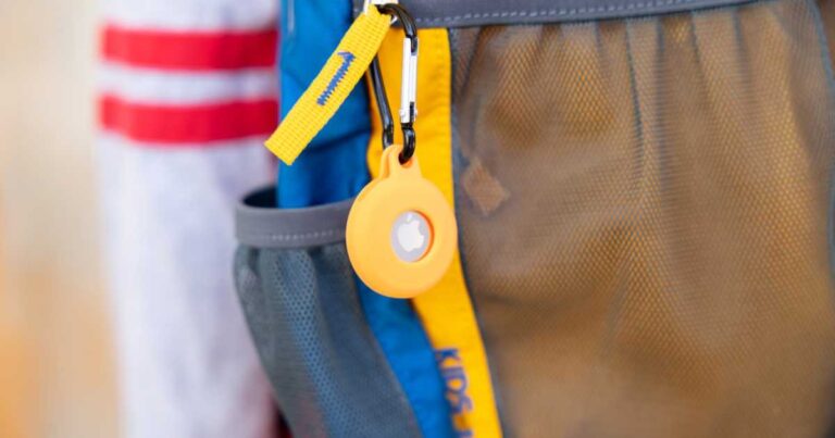 AirTag on Child's Backpack, A Tracking Device to keep track of your stuff stock photo