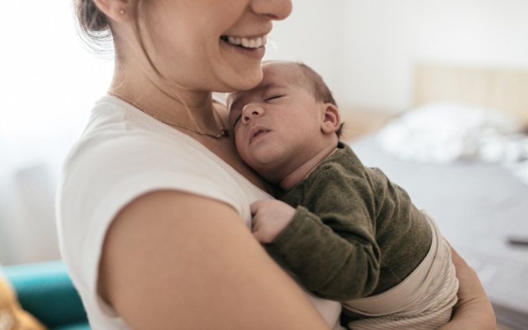 mom and baby in nursery