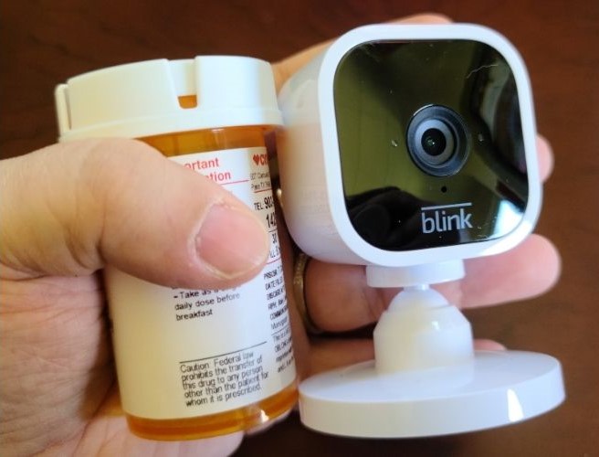 Blink Mini and pill bottle