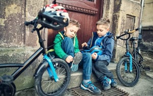 photo of kids with their bikes