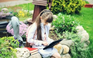 Girl playing on laptop