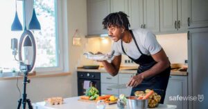 male-cooking-in-front-of-recording-phone