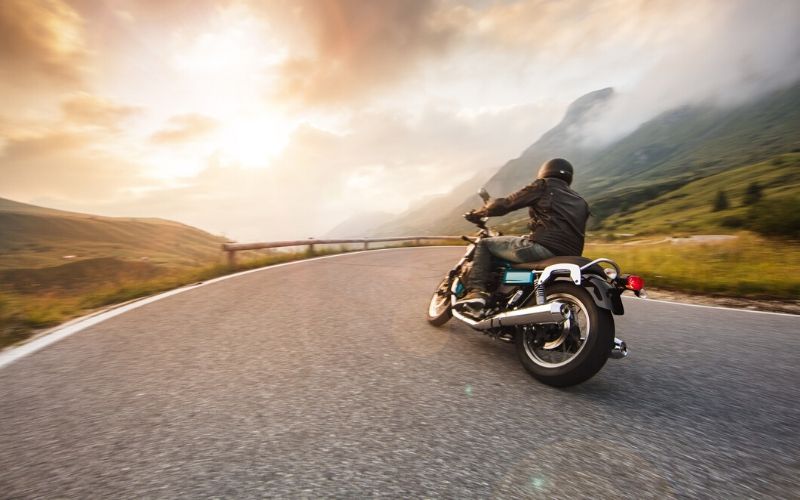 motorcycle rider on a rural road