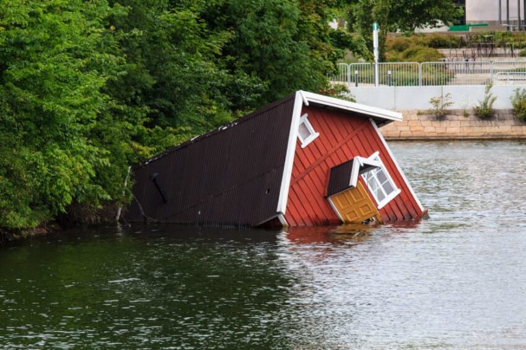 red house going under water