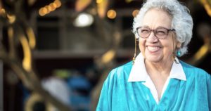 Smiling older woman with glasses