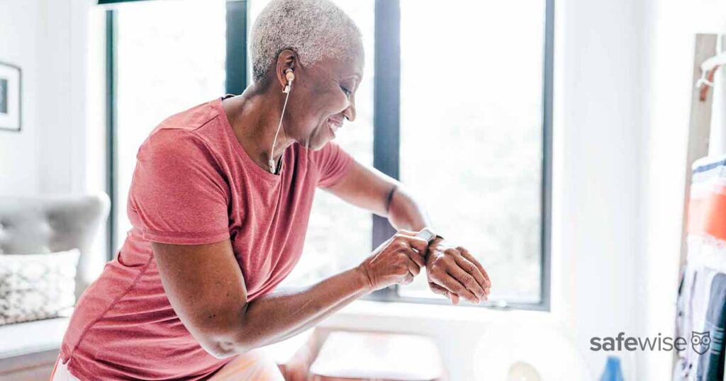 senior-woman-using-safety-device-on-wrist