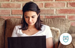 Woman using laptop in home