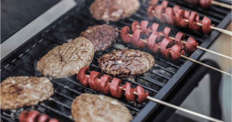 hot dogs and hamburgers on grill