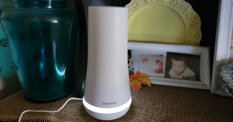 SimpliSafe base station on desk, lit up